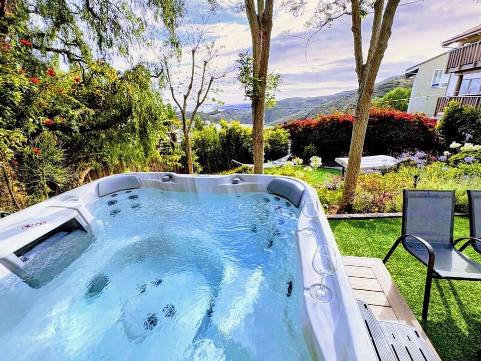 Relax in the hot tub with spectacular views