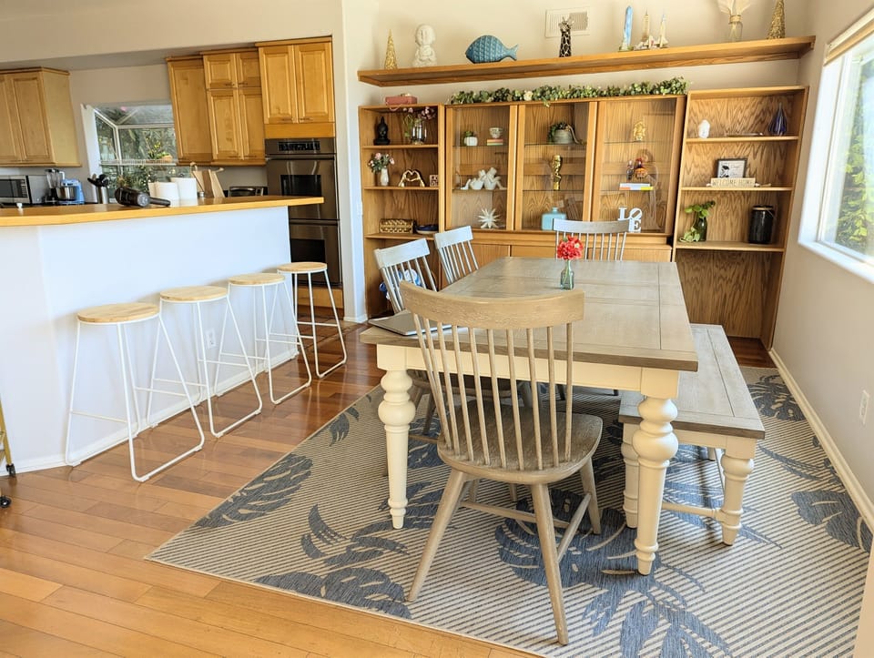 Dining room with a nook with seating for 10