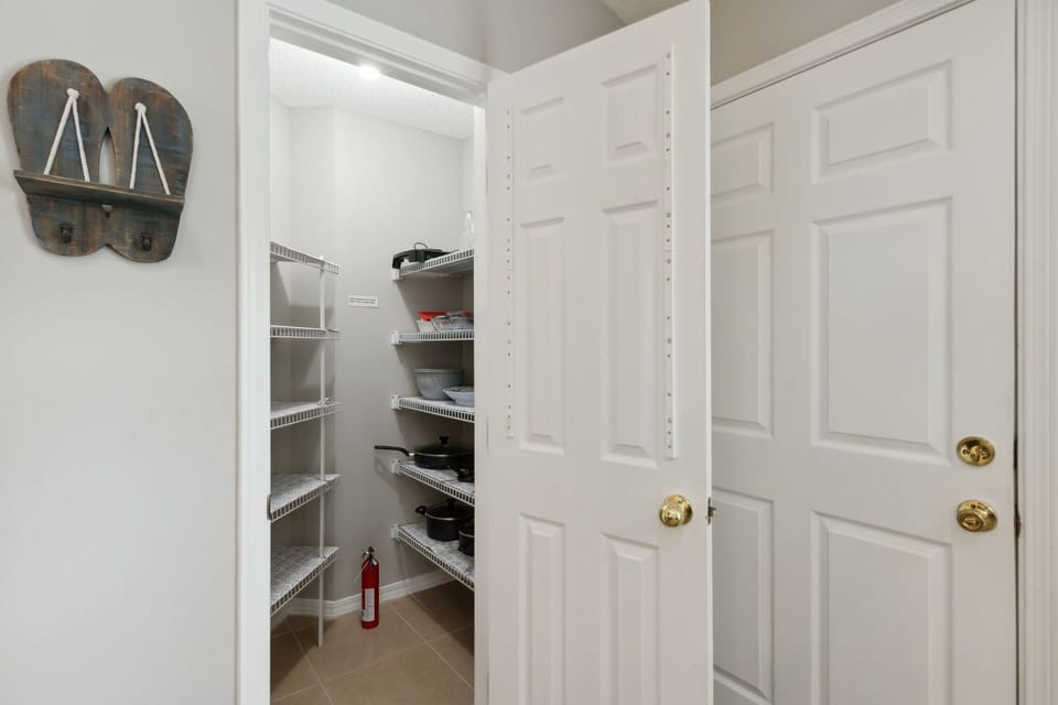 Large walk-in pantry with plenty of room for your groceries
