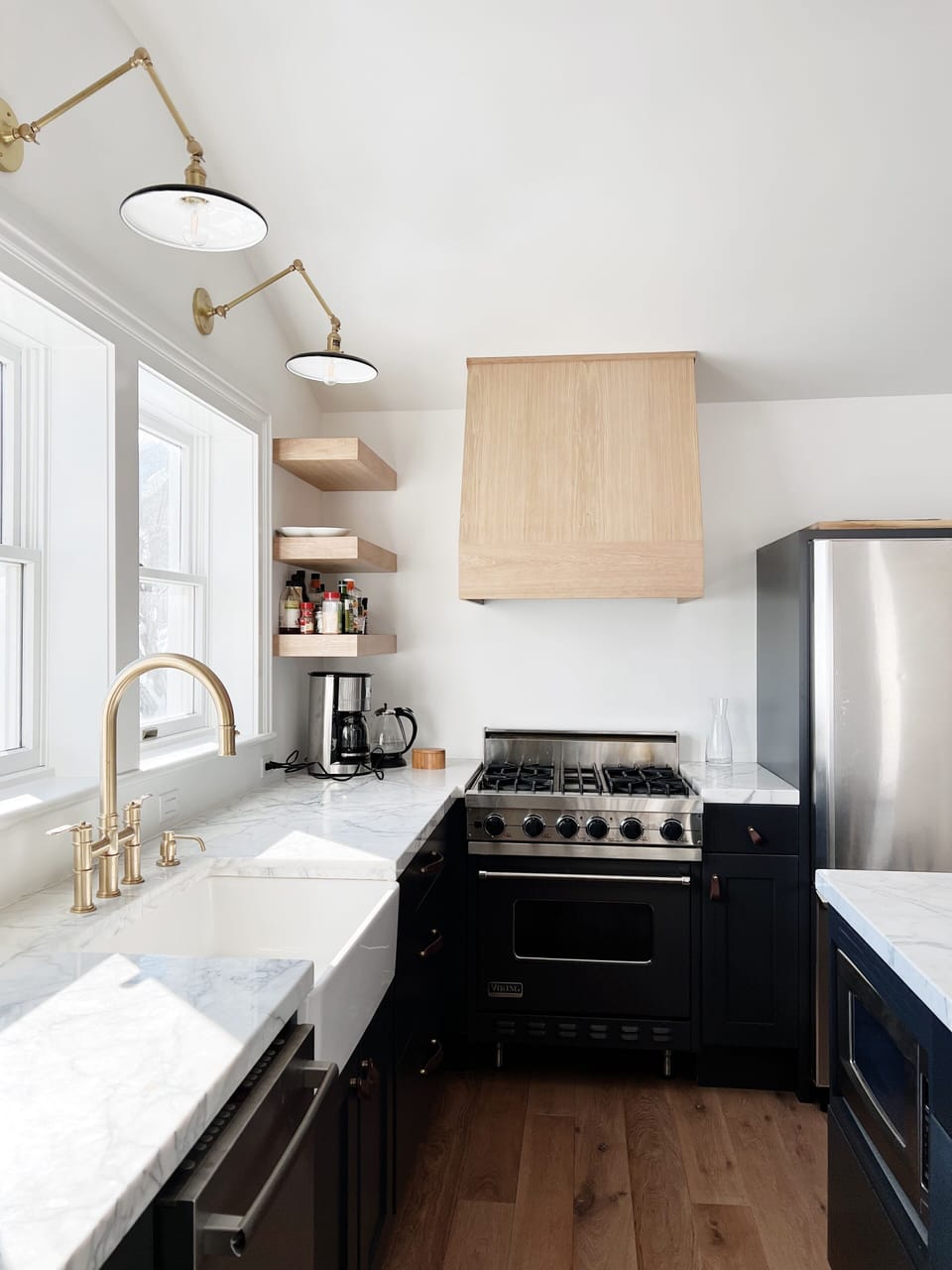 Wolf range and custom wood hood.