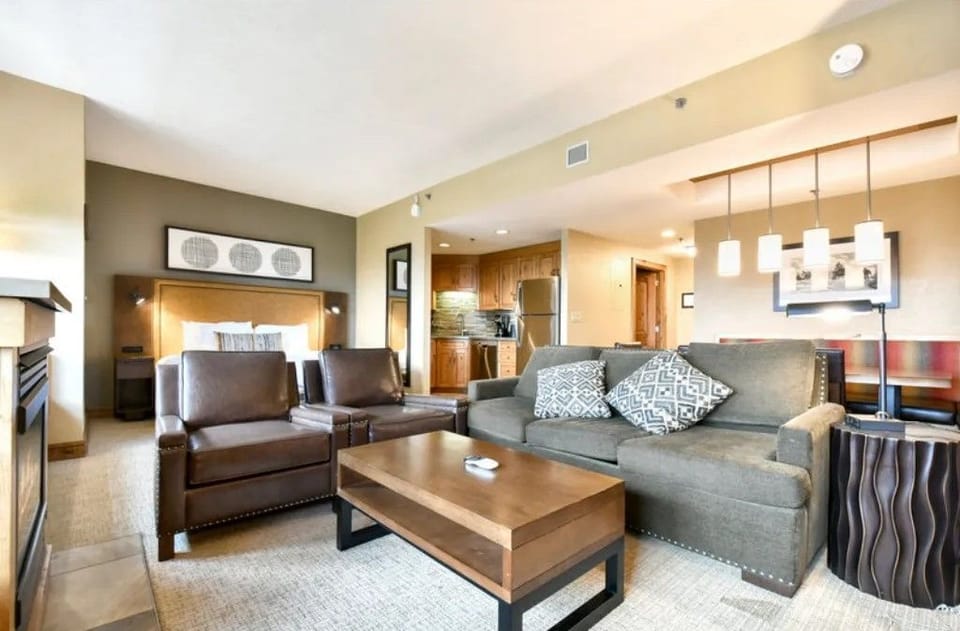 Cozy living room with comfortable seating and a warm ambiance.