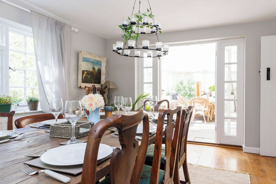 Elegant dining area with plenty of natural light, perfect for family meals and gatherings