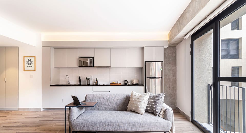 The building contains several similar units, Furniture, decor, and amenities may vary.