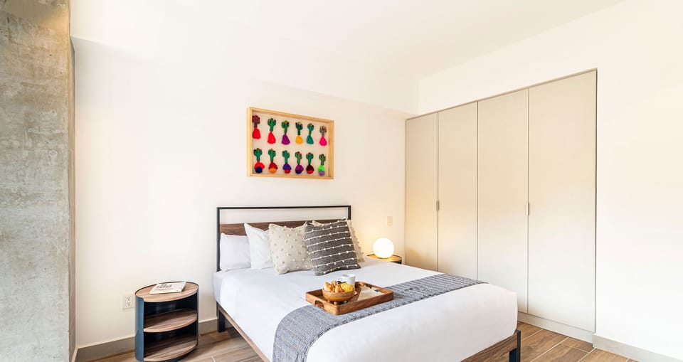 The building contains several similar units, Furniture, decor, and amenities may vary.