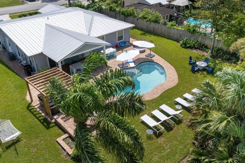 Aerial view of Sun & Salt Retreat with private heated saltwater pool in Jacksonville Beach