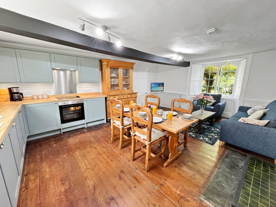 Kitchen/Lounge (looking to kitchen and front garden)