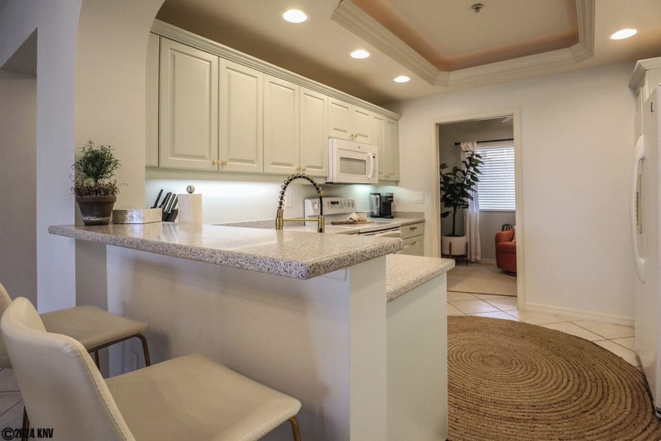 Wonderful Kitchen has all new appliances and Corian countertops