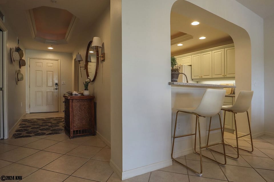 Kitchen features a breakfast bar for 2