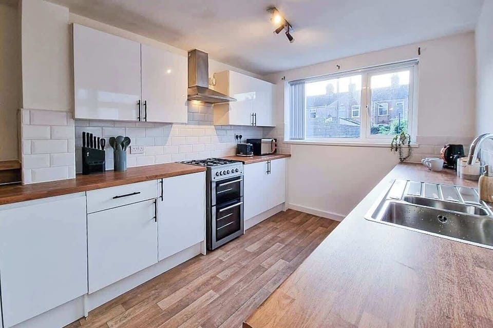 Modern and functional kitchen area, designed for preparing delicious meals and making cooking a pleasure.
