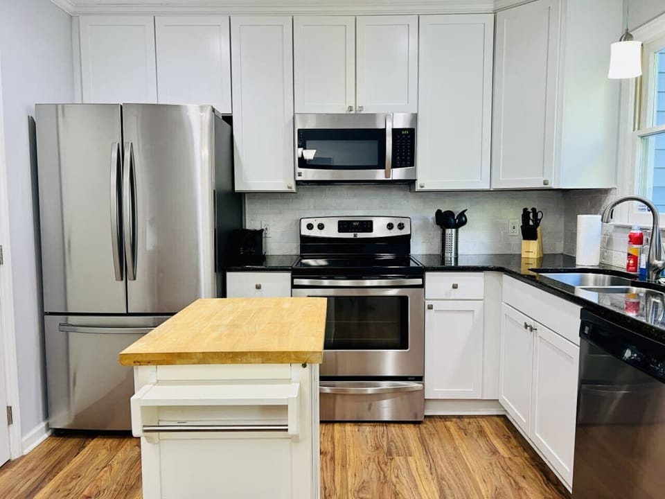 The heart of the home, this kitchen offers convenience and comfort for all your cooking needs.