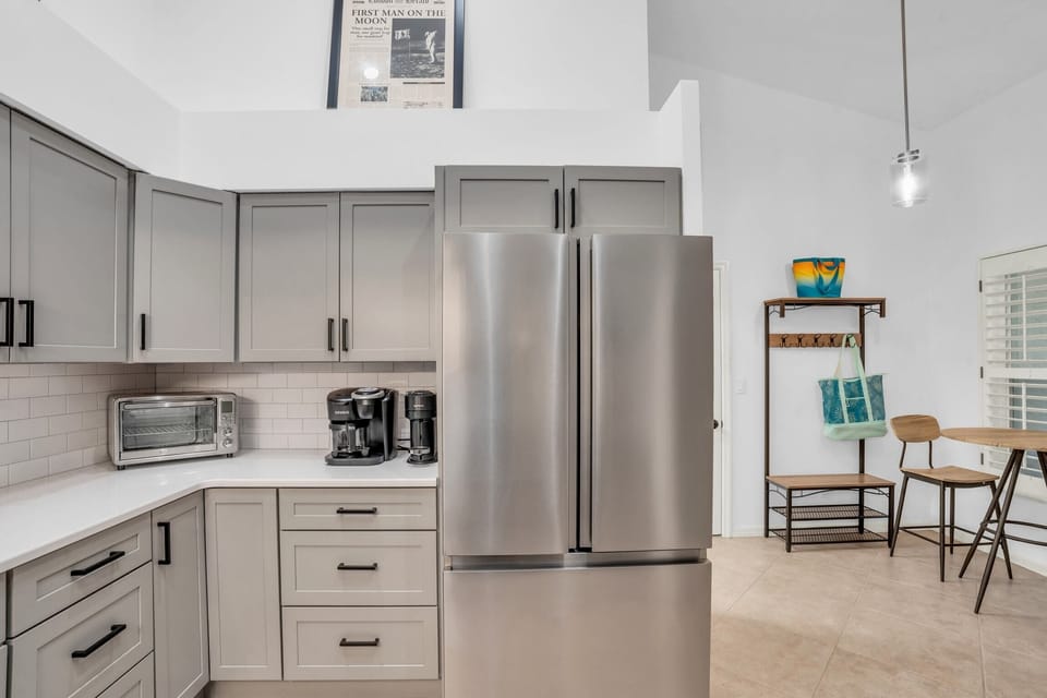 The kitchen has stainless steel appliances