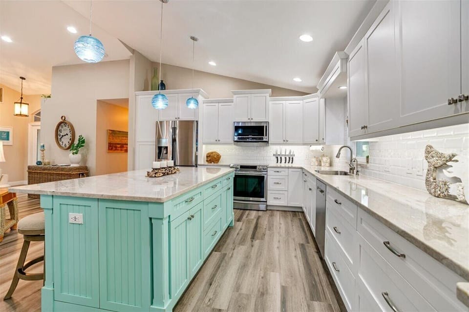 Another view of the expansive counters and storage available in the kitchen 