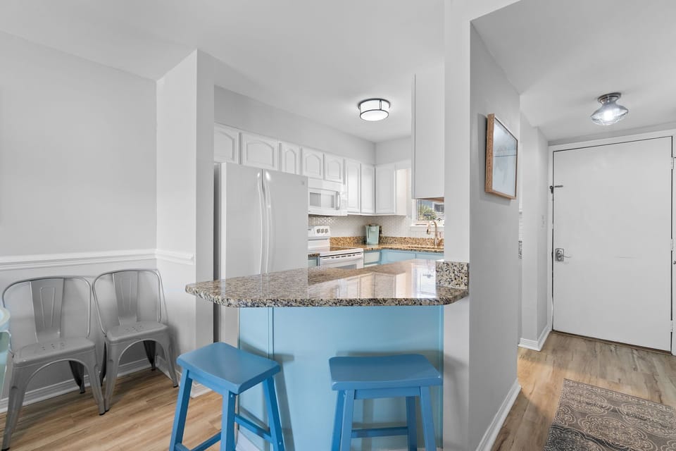 Breakfast bar area with seating for two