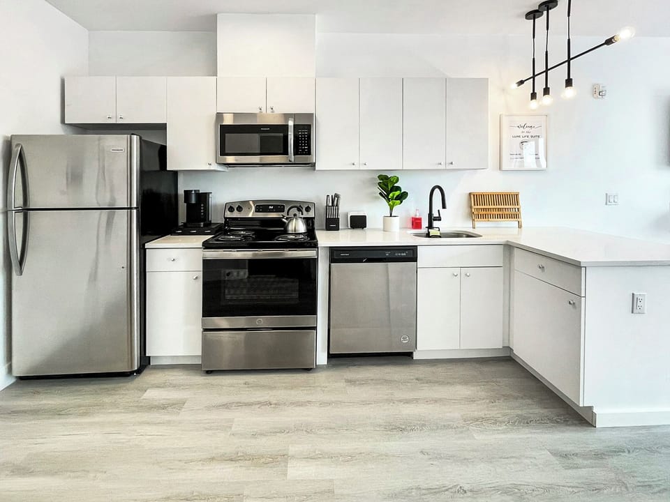 Open-concept kitchen, including breakfast bar