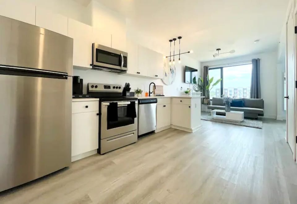 Open-concept kitchen
- utensils
- knife set
- Keurig coffee maker
- cutting mats