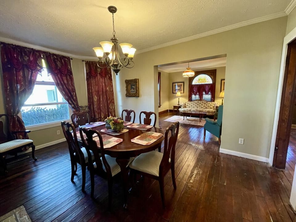 Spacious dining room between kitchen and living room