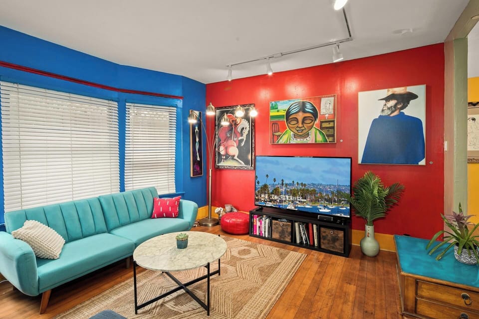 Living Area, Mid-century sofas, art-filled walls, and natural light for relaxing gatherings