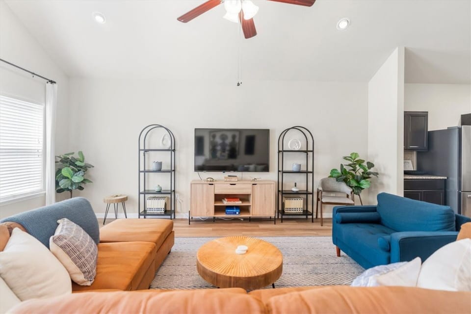 This boho decor is cute and functional. Enjoy streaming your favorite TV shows on this smart TV!