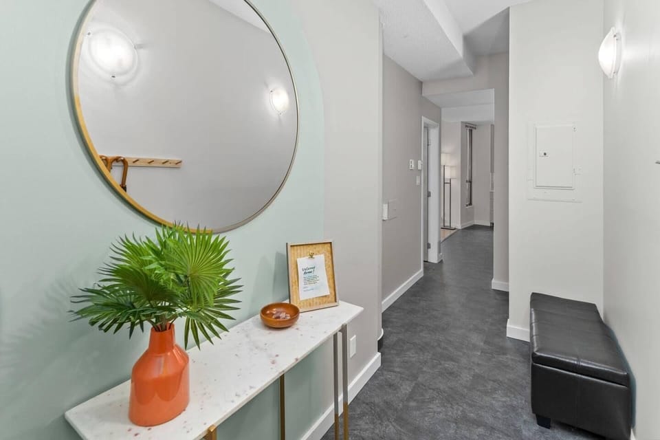Bright and airy entryway with modern decor and natural accents