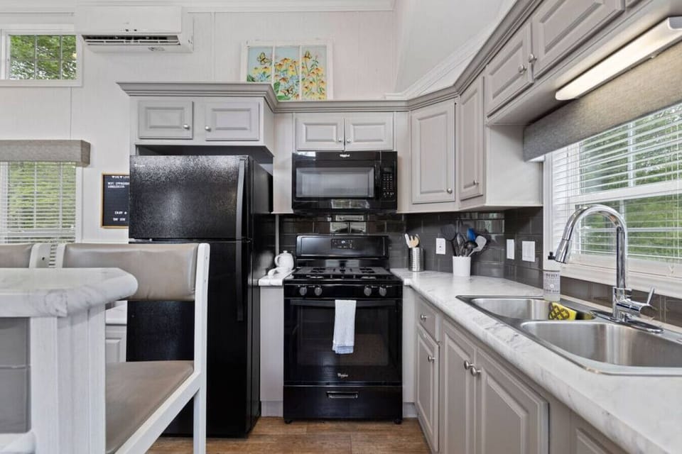Full size oven and refrigerator.