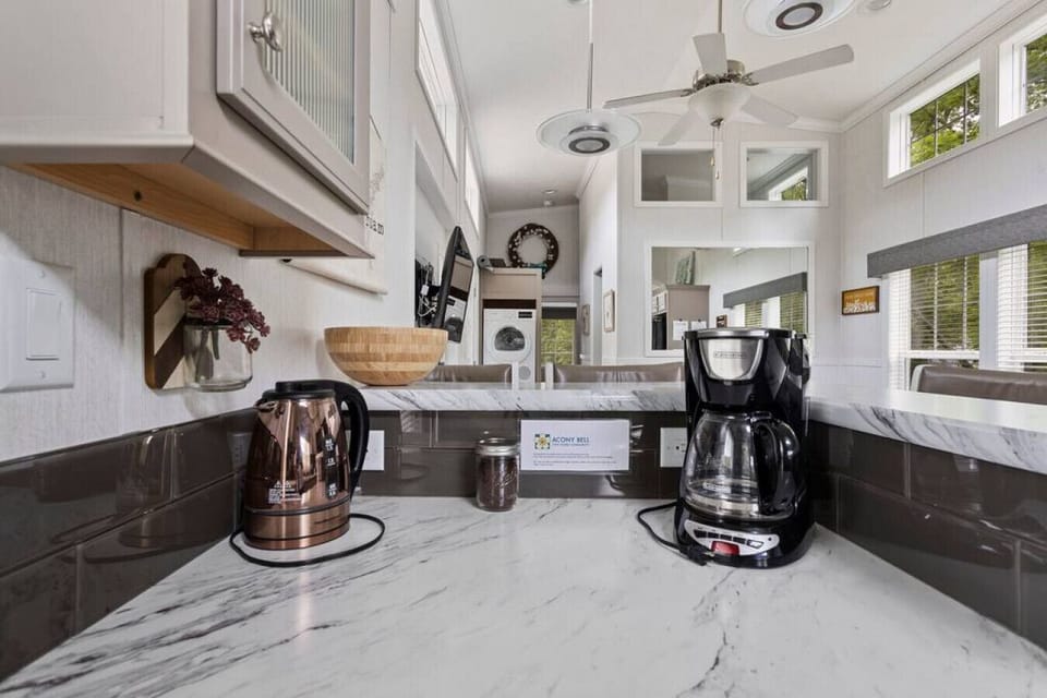 Kirch is stocked with coffee pot and hot water appliance