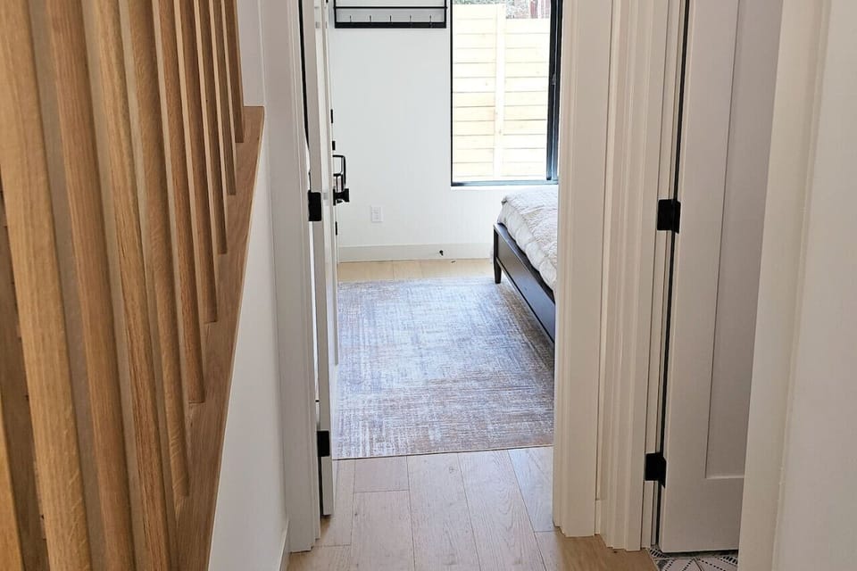 Inside 1st floor entry looking to the 2nd bedroom and bathroom