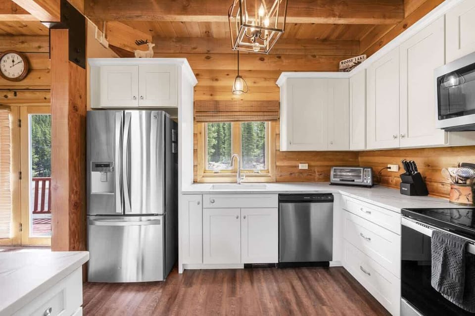 Functional and beautiful, this kitchen comes fully equipped with cookware, utensils, and small appliances.