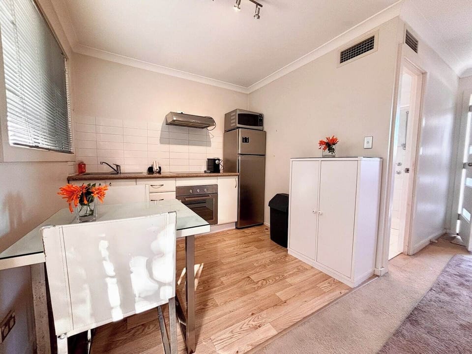 Kitchen and dining area in your open concept townhouse