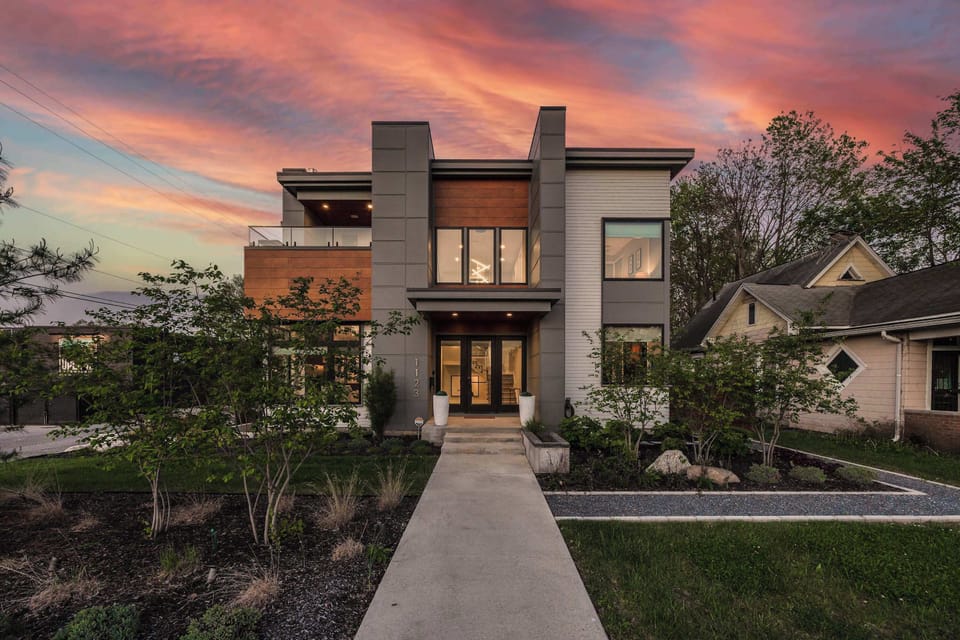 Welcome to your ultimate retreat in the heart of Fountain Square, Indy's vibrant cultural district. This luxury custom-built 5-bedroom haven features an upstairs deck with a city view. 