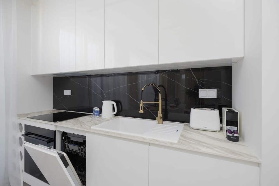 Modern kitchen appliances – Functional and sleek, ideal for longer stays.

