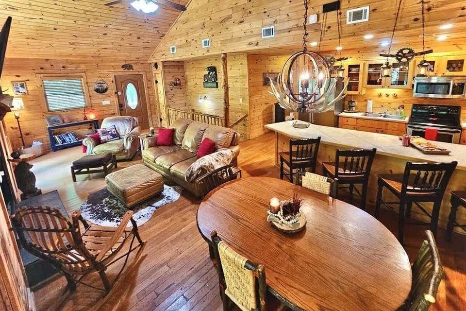 Gather together in the cozy living space while the kitchen and dining area keep everyone connected.