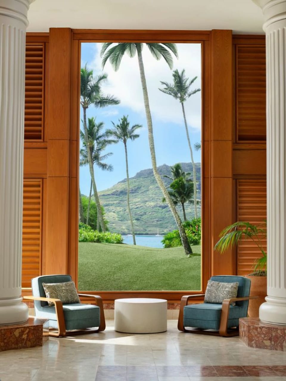 Linger in serene seating while palm-framed views steal the show.