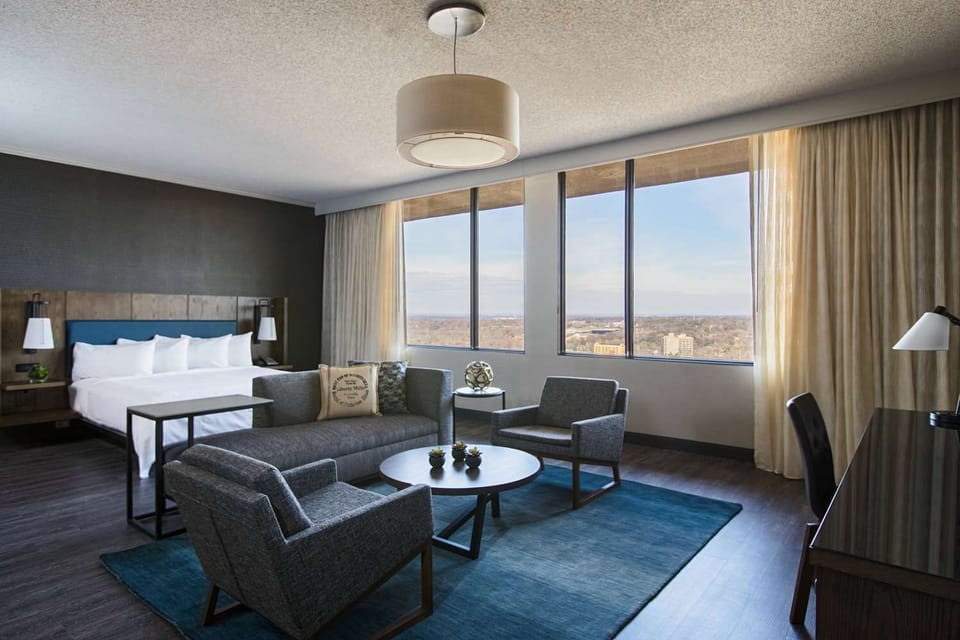 Unwind in a spacious suite with sweeping skyline views.