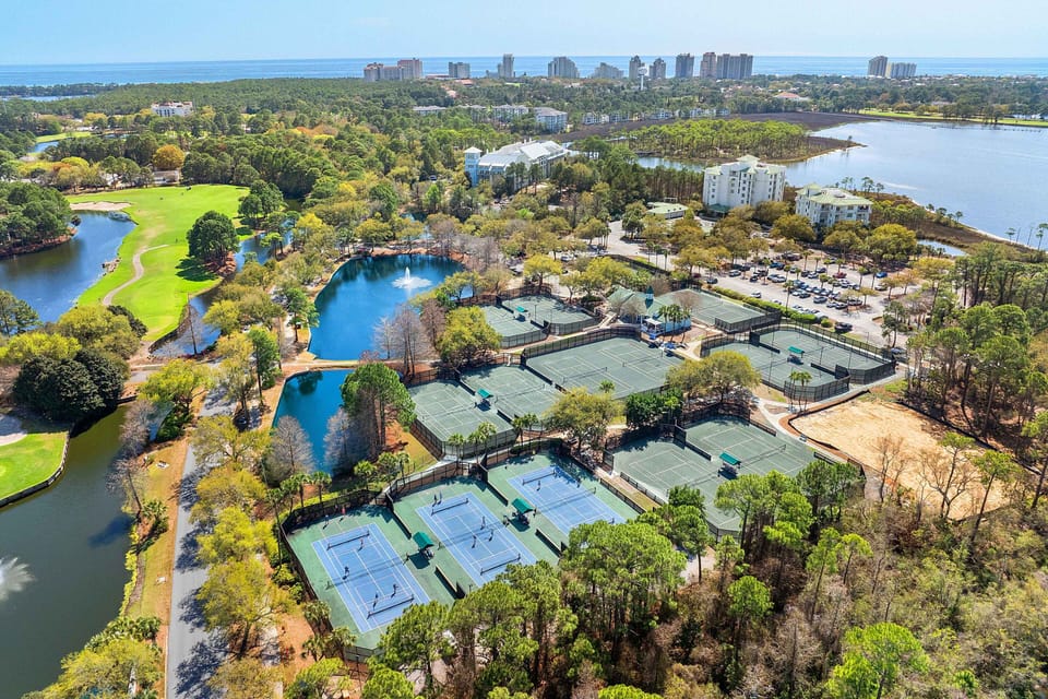 Sandestin's Tennis Center - Enjoy access to lighted clay tennis courts and dedicated lighted pickleball courts for day or night play.