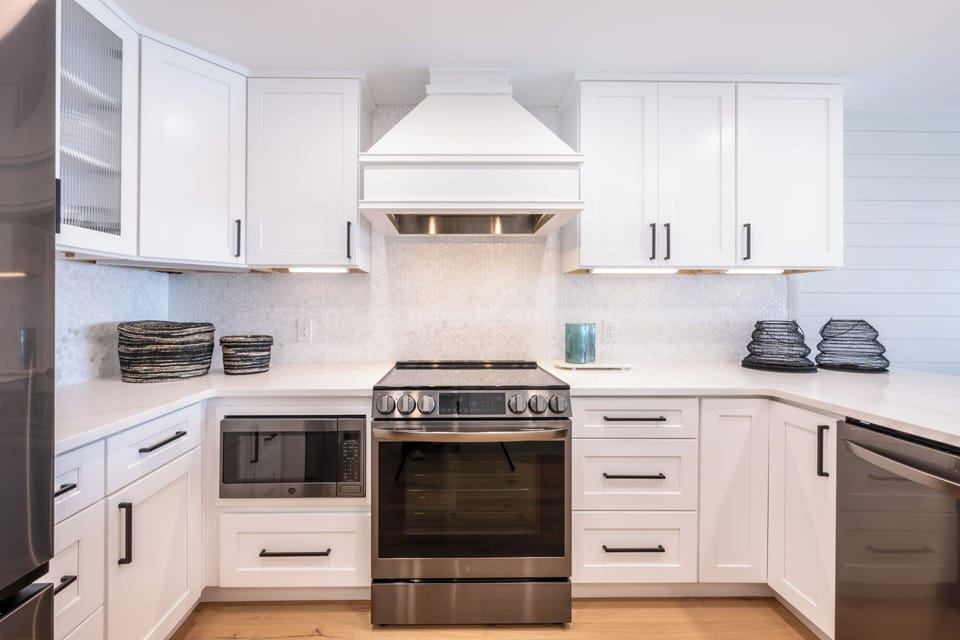 The fully remodeled kitchen is fully equipped with everything you need to cook and enjoy meals during your vacation.