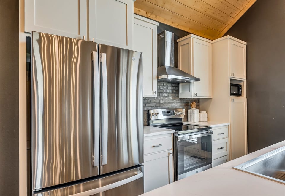 A chef’s dream! This kitchen features modern appliances and ample counter space, making meal preparation a breeze.
