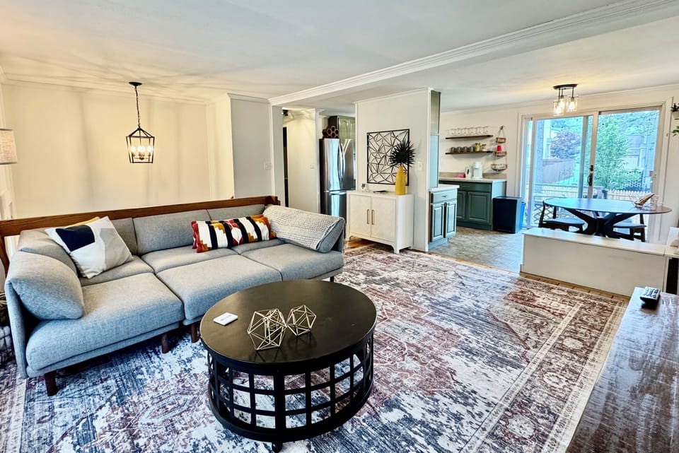 Open concept living, dining and kitchen area for a comfortable stay