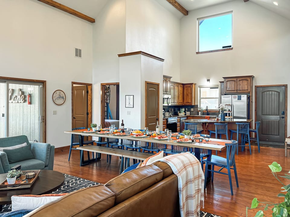 The living room and dining table are right next to the full size and fully stocked kitchen.