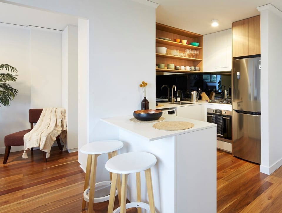 KITCHEN: The kitchen has a useful preparation bench which provides seating for two. 