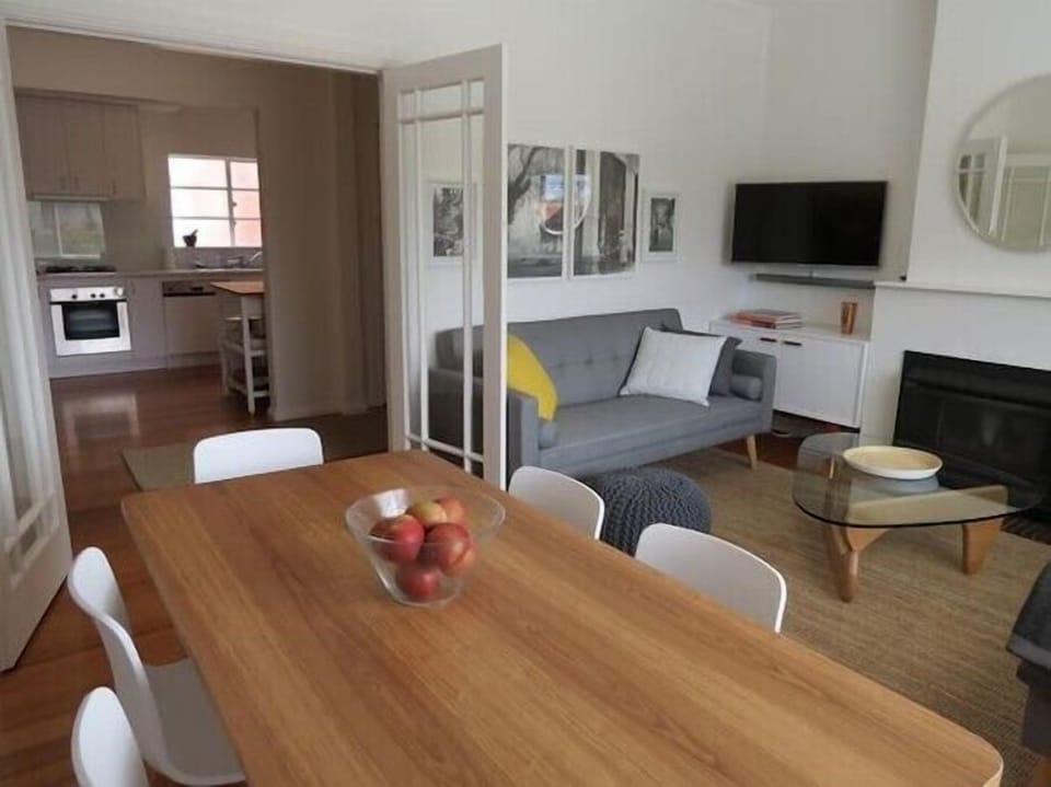 OPEN LIVING. The apartment's spacious dining, living and kitchen areas flows well together.