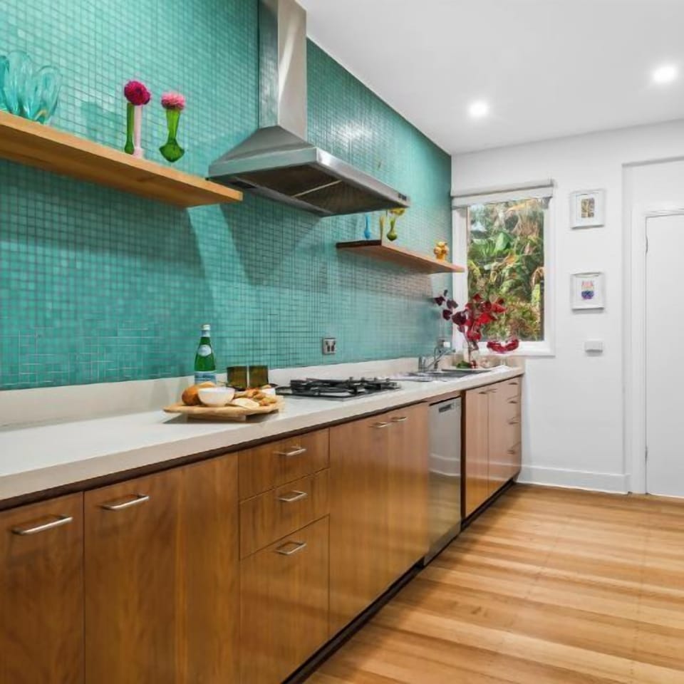 KITCHEN: The large, bright Kitchen has all the needed modern appliances and a well stocked pantry for cooking pleasure. 