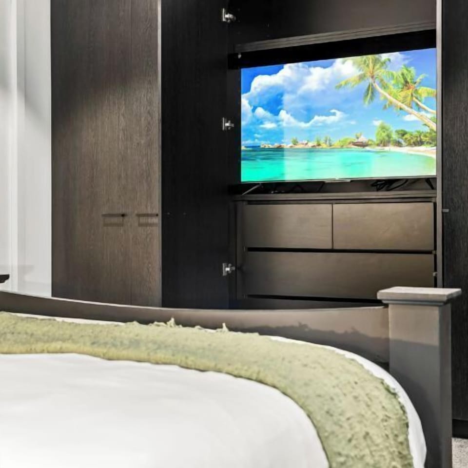 MASTER BEDROOM: The bedroom has generous built in wardrobe with a large screen Smart TV with Netflix.