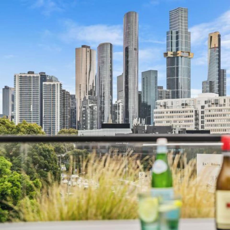 DECK: The top deck is perfect for al fresco dining and entertaining with the city outlook that lights up at night. 