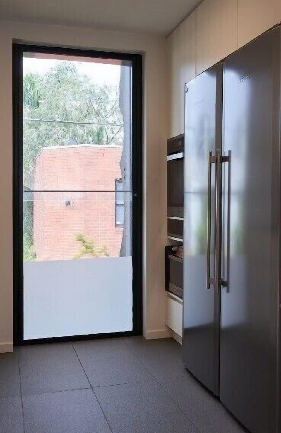 QUALITY APPLIANCES. The side by side Liebherr fridge is big enough for the largest family.  