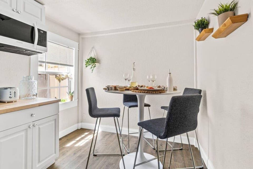 Comfortable dining space for four located beside the fully equipped kitchen. Perfect for family meals, morning coffee, remote work, game nights,