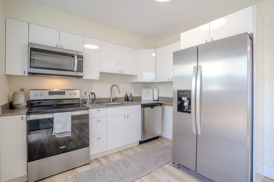 In addition kitchen includes, plates, cups, utensils, basic pots and pans