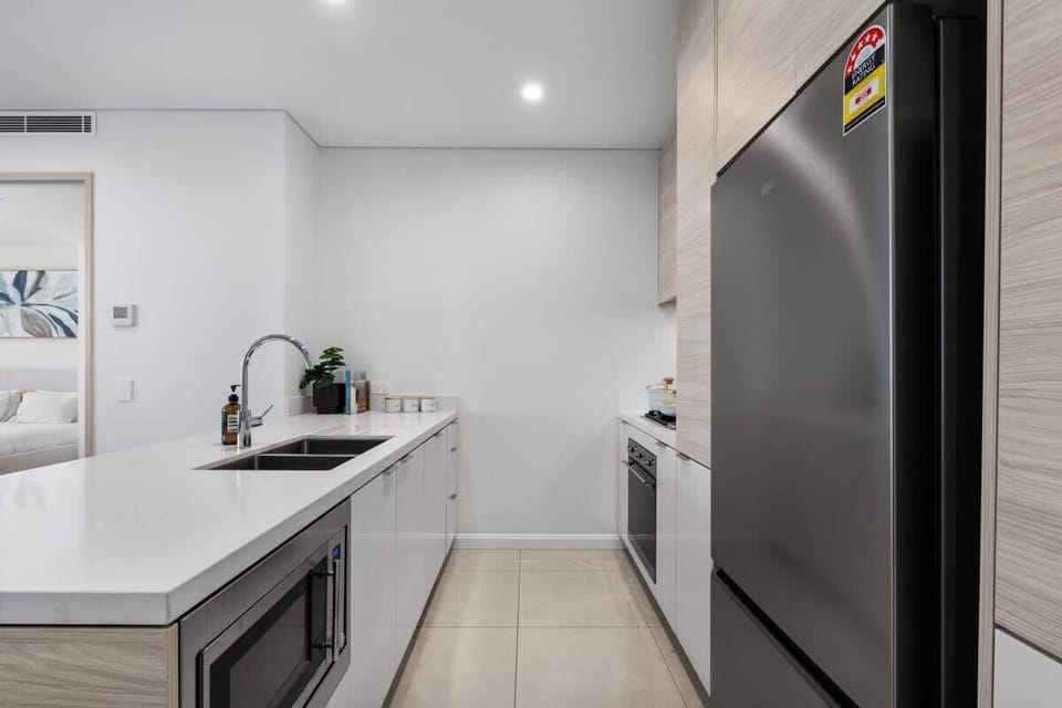 All necessary appliances you will need, a brand new fridge, built-in microwave, dishwasher and oven.