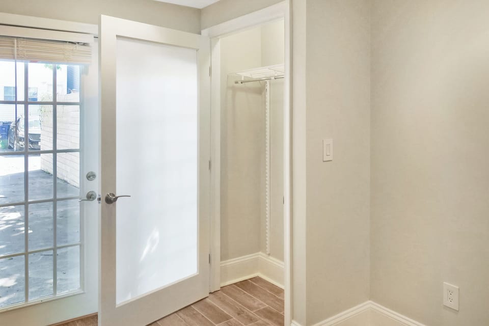 Bedroom with Double Closets and Queen Bed