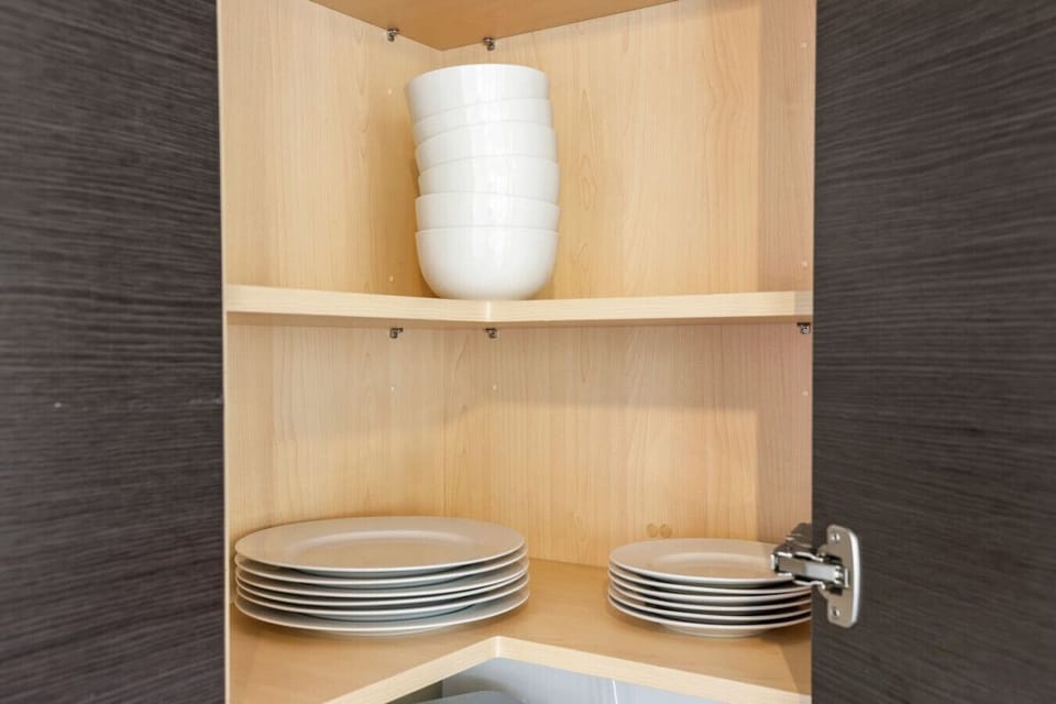 🍽️ Kitchen essentials ready with plates and bowls neatly organized, perfect for shared meals with loved ones 👨‍👩‍👧‍👦❤️