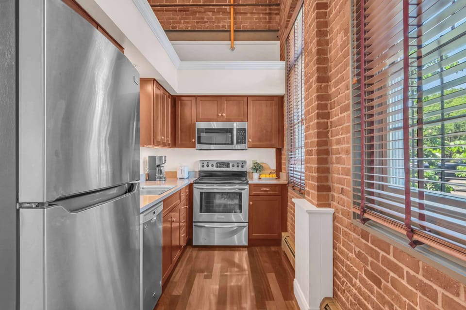 Kitchen has dishwasher and microwave